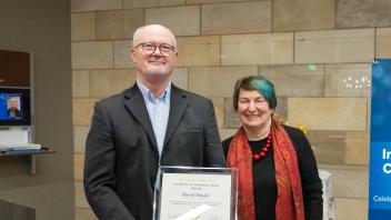 Excellence in Teaching of Study Abroad Awardee David Masiel and Vice Provost and Dean Joanna Regulska