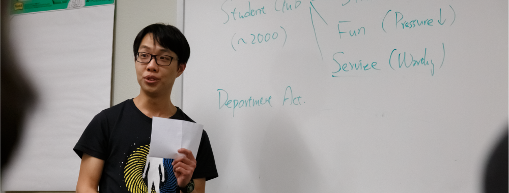 student presenting at a whiteboard
